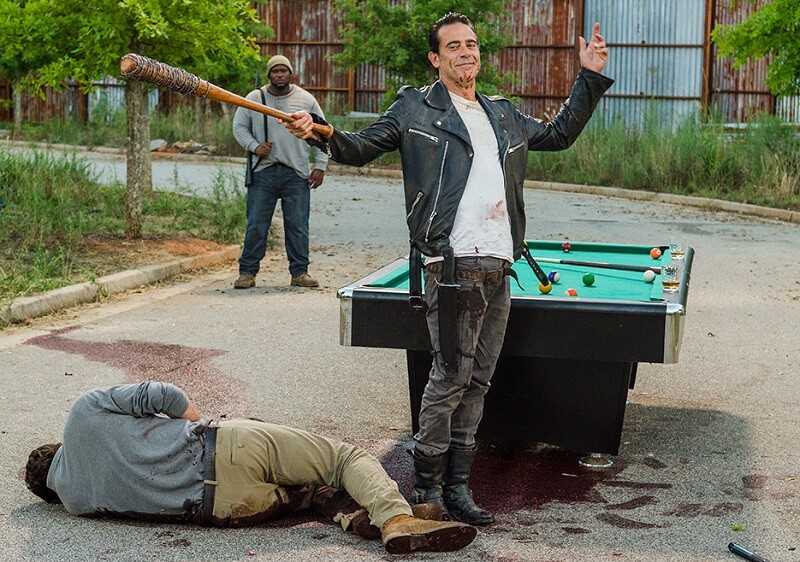 Negan holding up Lucille after killing Spencer