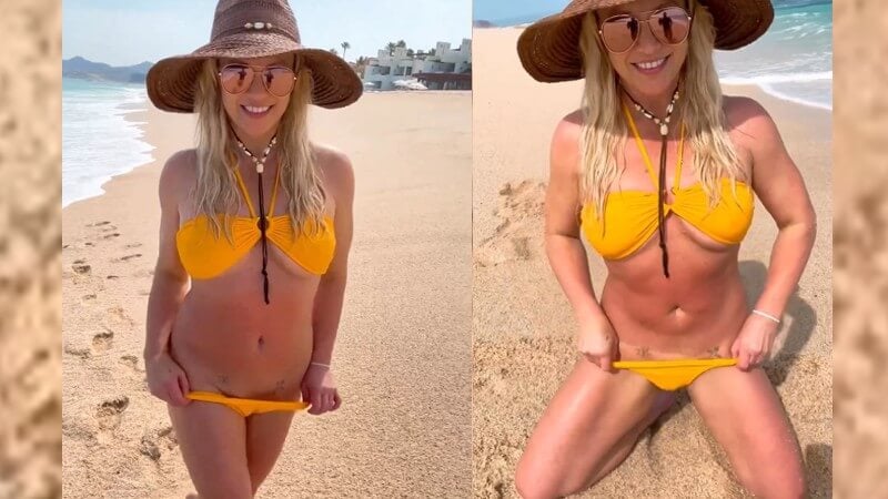 Britney Spears flashes bikini line in yellow swimsuit in summer video