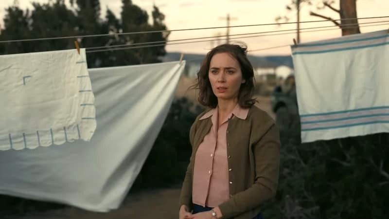 Emily Blunt as Kitty Oppenheimer in Oppenheimer.