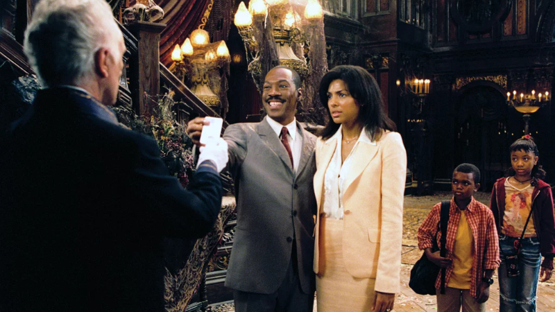 Eddie Murphy and his family have a conversation in Haunted Mansion (2003) in the original Disney theme park-inspired film