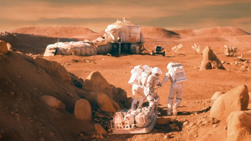 Astronauts walk the surface of Mars in in Mission to Mars, a Disney theme park-inspired film.