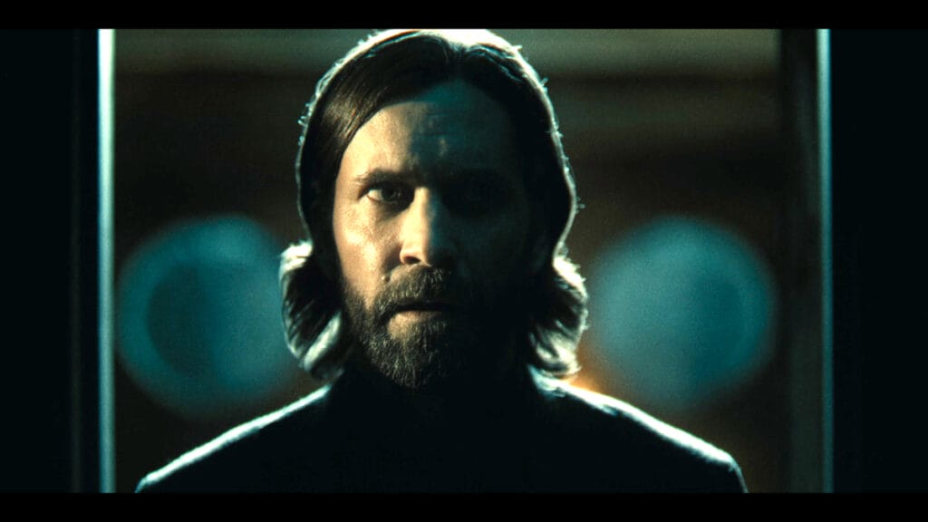 Alan in shadow in Alan Wake 2
