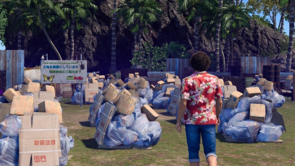 Kasuga looks at the trash he needs to clean up on Dondoko Island