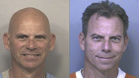 Erik and Lyle Menendez grin widely on their mugshots from jail in California.
