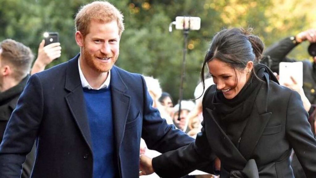 Prince Harry and Meghan Markle in coordinating outfits.