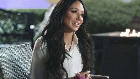 Melissa Gorga sitting in a chair during an episode of RHONJ.