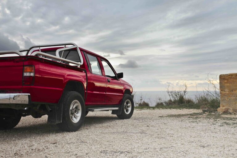 A picture of a red truck in relation to the Florida man's truck