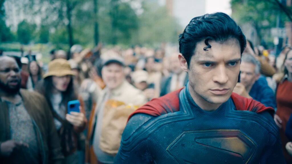 A crowd attacking Superman