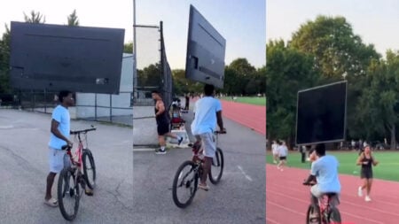 75-inch TV balancing on bike